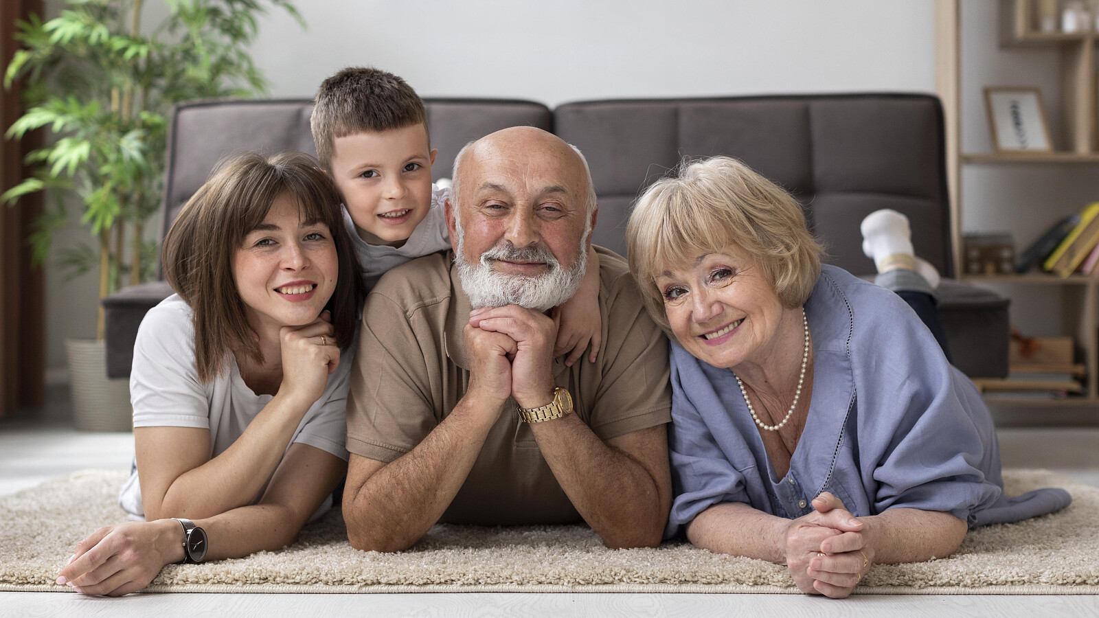 full-shot-happy-family-posing-floor.jpg [1.61 MB]